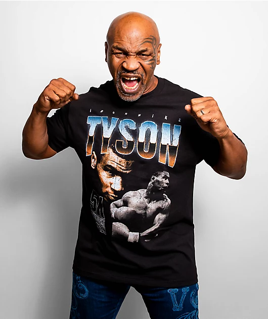 The Mike Tyson name goes far beyond the ring and now to lifestyle products. The Mike Tyson apparel line consists of graphic tees featuring popular quotes, pictures of vintage fights, and his "Tyson Ranch" brand. Sold online through his official store and platforms like Amazon, the tees find appeal among streetwear enthusiasts and boxing fans alike. Some even pay tribute to his 1980s prime, touting them as retro collector's items. By partnering with companies such as Roots of Fight, Tyson's tees also became mainstream pop culture wear. His merchandise still rakes him a fortune and keeps his name in the public eye.