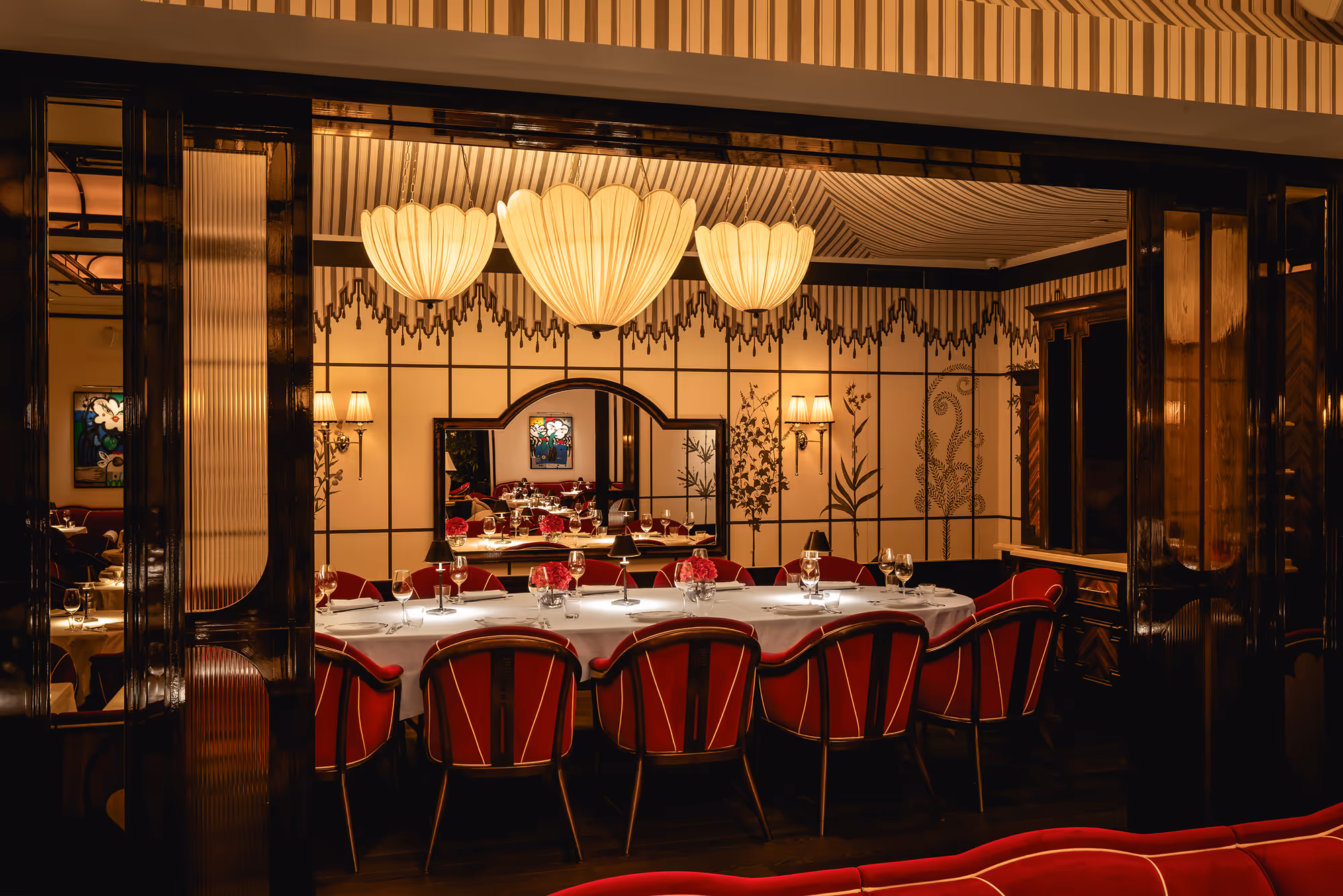 Bund London  Average Cost   £30–£50 approximately (for one)    Timings  Monday-Sunday  12.00 PM – 1.00 AM    Bund London Number  +44 20 4553 5888    Bund London Location  28th Floor, London Hilton on Park Lane   22 Park Lane, London W1K 1BE, United Kingdom