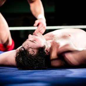 man exhausted from fighting