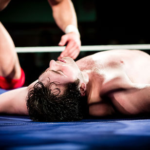man exhausted from fighting