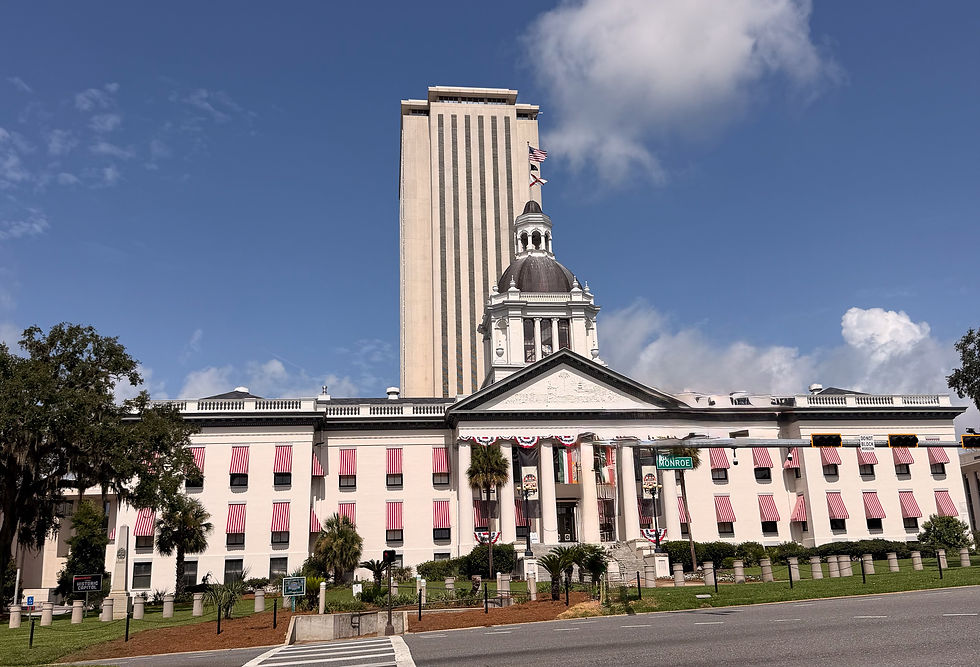The Florida State Capitol (old in front of new).  We visited the historic building, which went through multiple expansions from 1845 to 1977, when the new complex was complete.  They had planned to knock it down but citizen campaigns saved it.  We walked through a recreated Supreme Court, Governor's Office, and House and Senate Chambers.  The "museum" also had a lot of history and information about the state.  