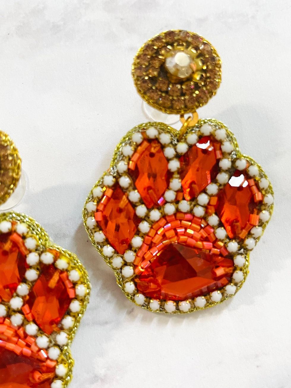 Thumbnail: Trendy Orange + White Beaded Paw Print Gameday Earrings
