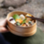 Japanese bento box , wel balanced in a traditional wooden magewappa box.