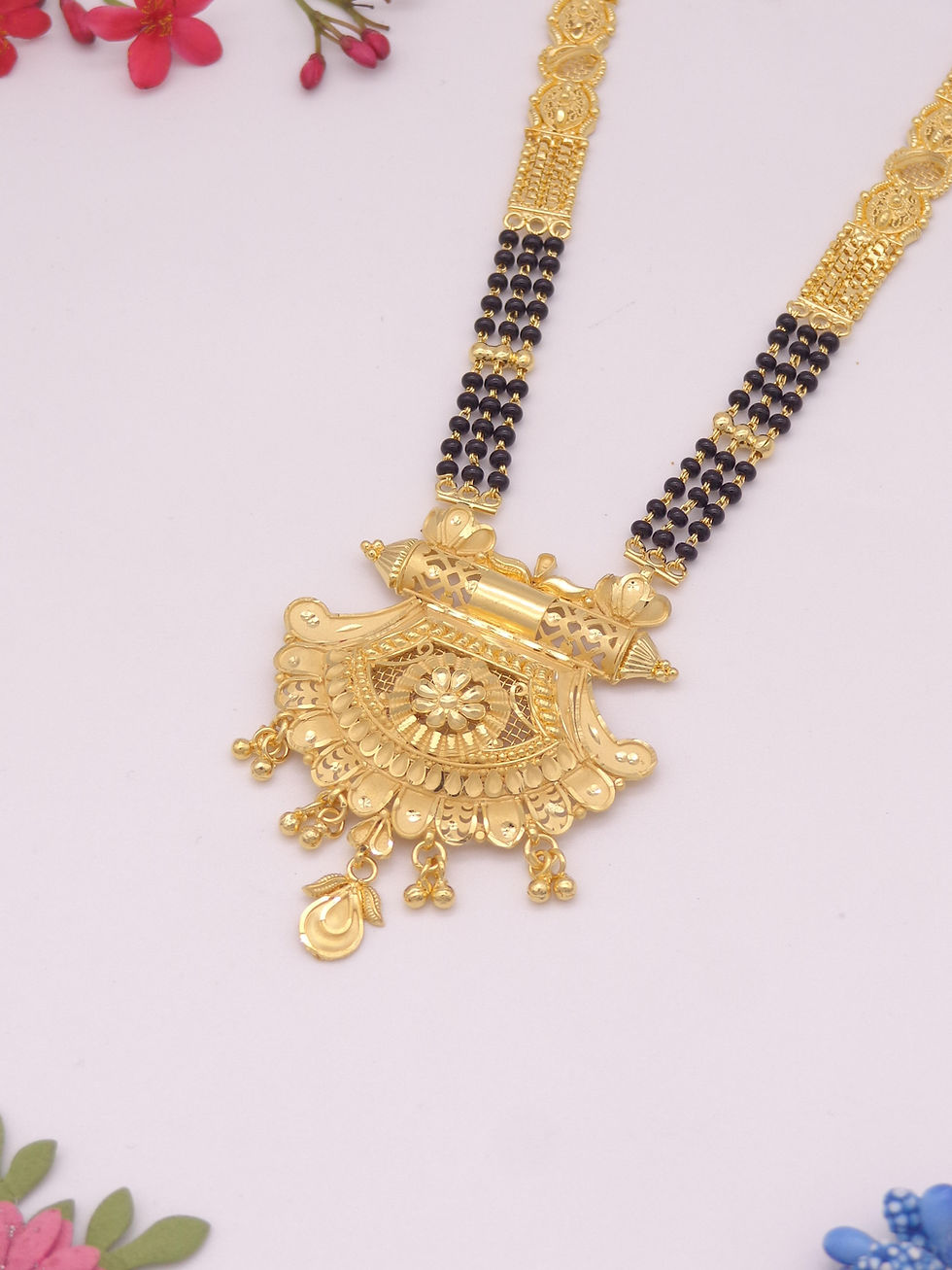 Thumbnail: Gold Mangalsutra necklace with black beads