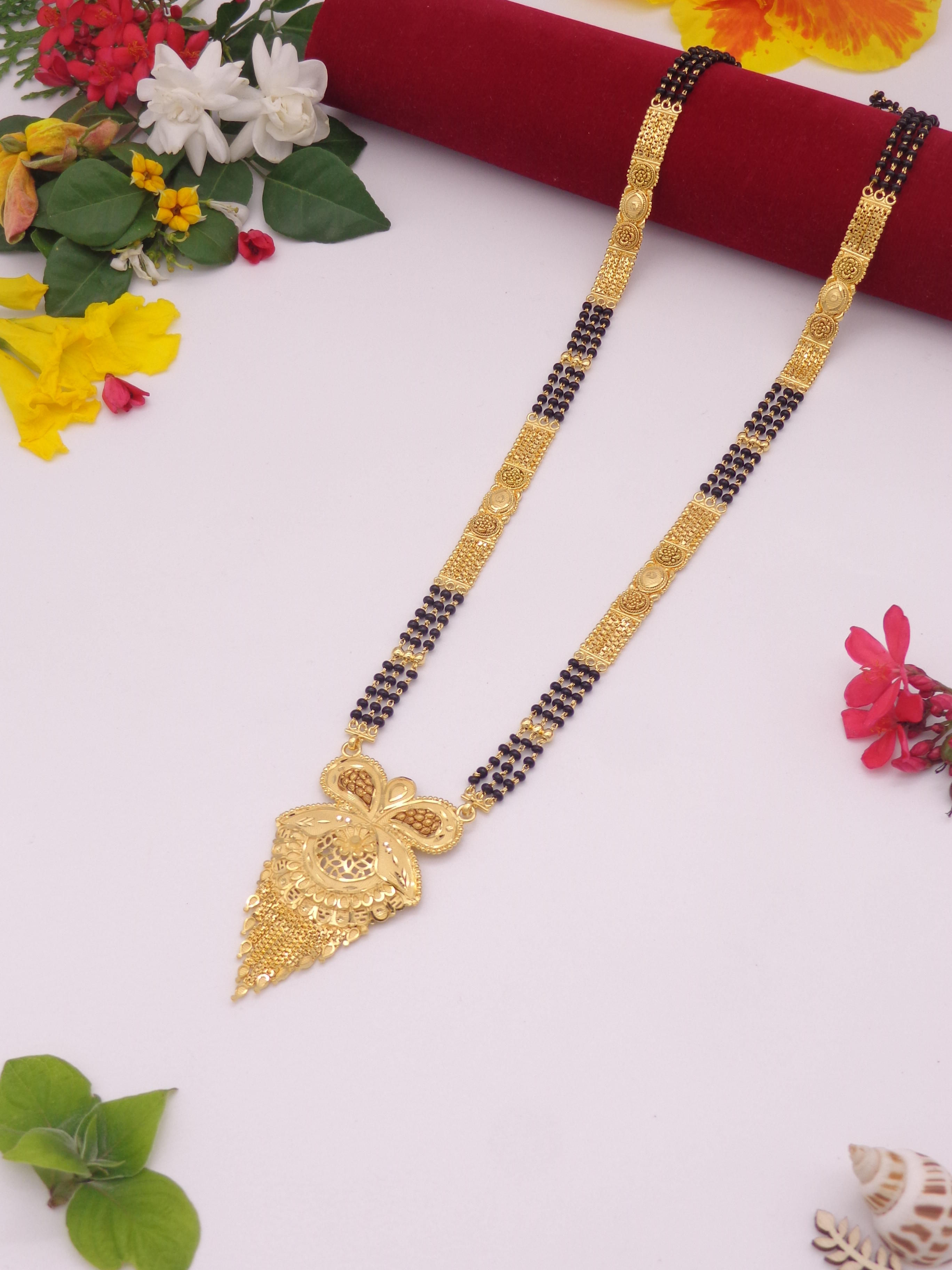 Gold Mangalsutra necklace with black beads