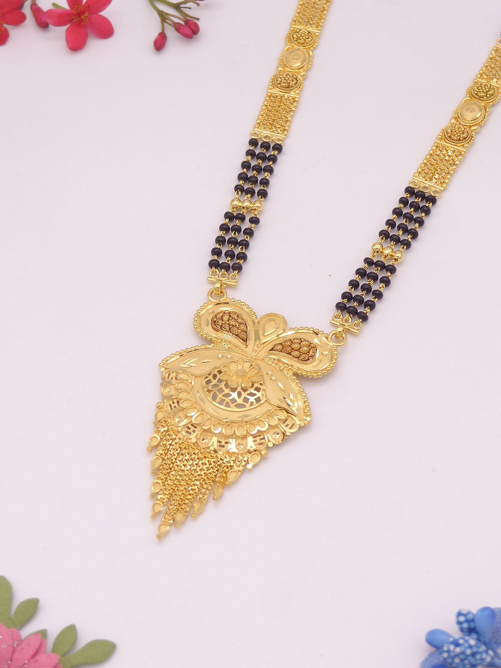 Thumbnail: Gold Mangalsutra: black beads, intricate pendant