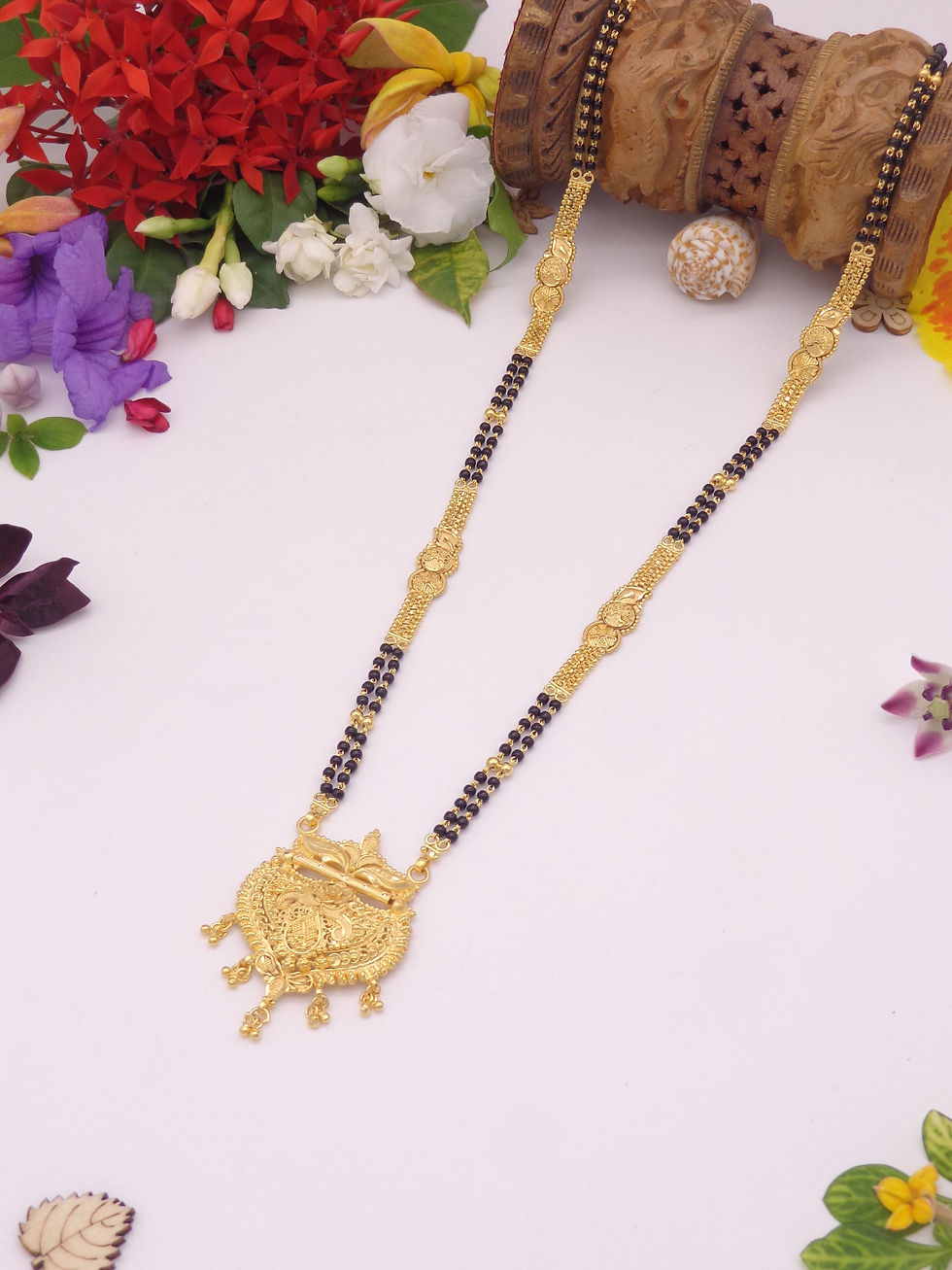 Gold Mangalsutra necklace with black beads