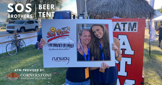 "SOS Beer Brothers Tent" - A picture of the SOS Beer Brothers tent with an adjacent ATM machine for cash withdrawals.
