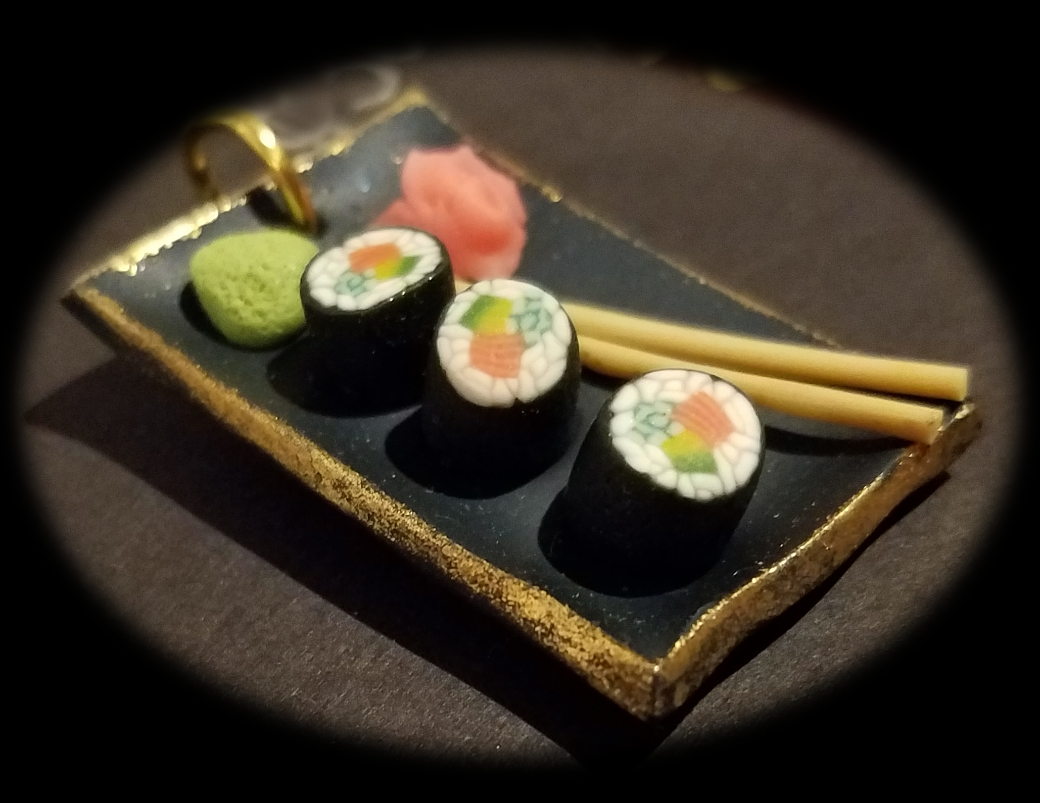 Sushi on Dark gilded Platter