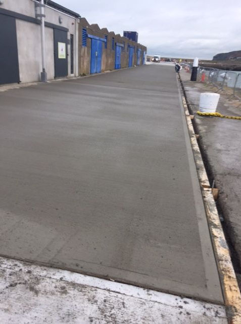 Freshly laid concrete surface at harbourfront, civil engineering works by Formac Construction Leinster