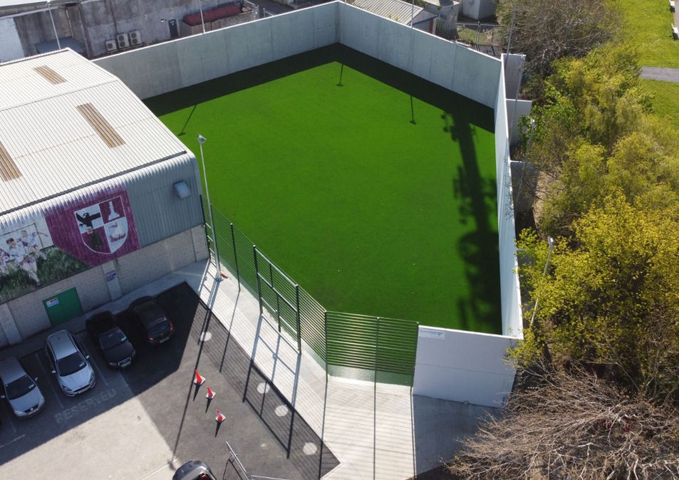 Completed artificial grass sports facility with concrete surround and boundary wall, Formac Construction Leinster