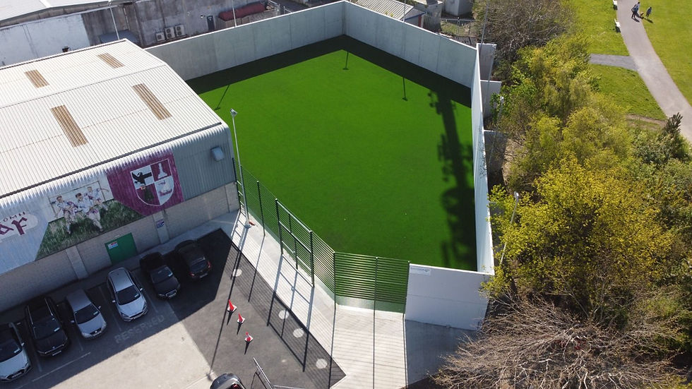 Drone view of completed artificial turf sports pitch and paved surrounds, Formac Construction