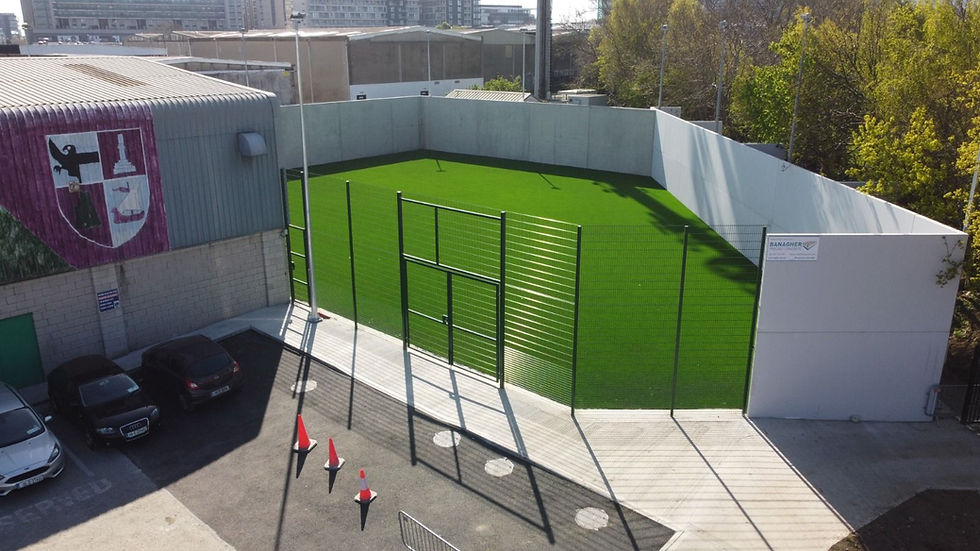 Drone view of completed artificial turf sports pitch and paved surrounds, Formac Construction