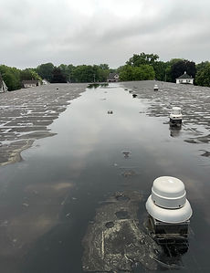 BEFORE_Preventative Roof Maintenance Roof Drain Blockage