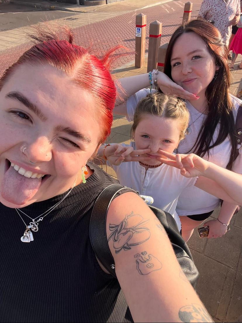 A joyful moment with my three girls, enjoying some fun in the sun and capturing memories together.
