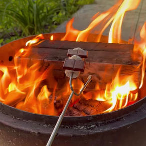 roasting marshmallow and melting chocolate hack, to make smores over a campfire