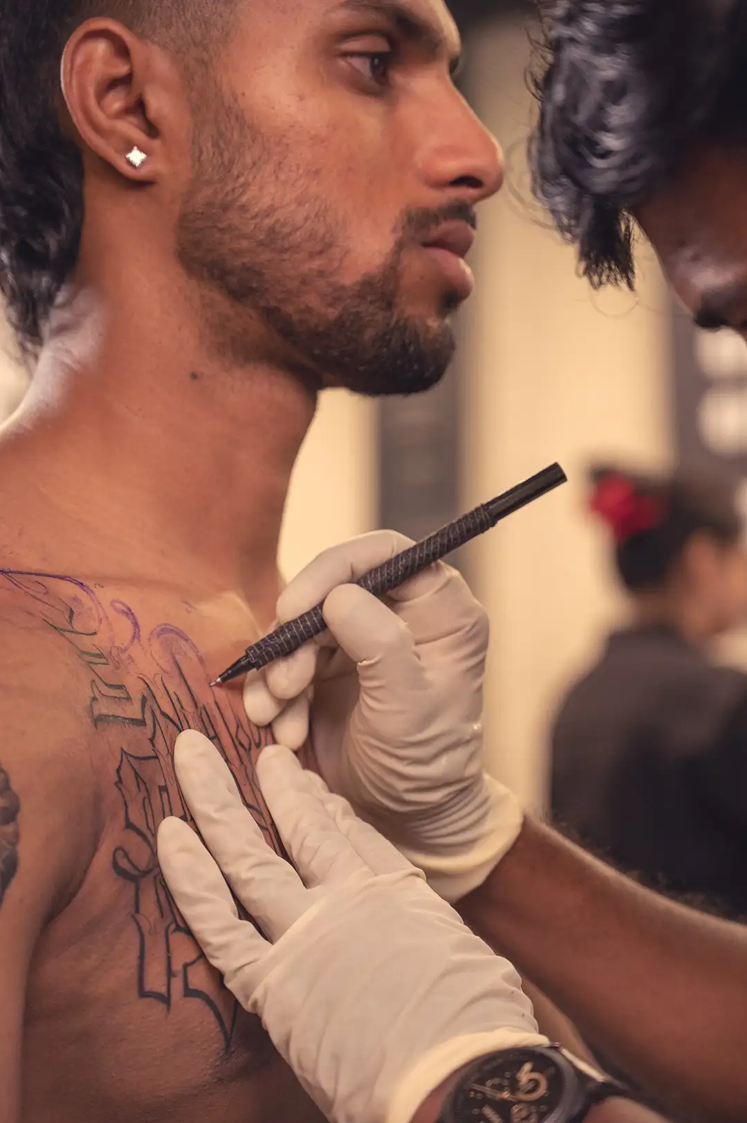 Tilak Verma Chest Tattoo at Aliens Tattoo