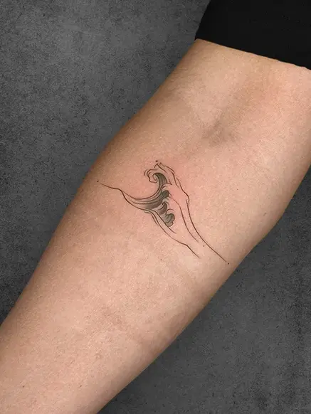 small ocean wave tattoo