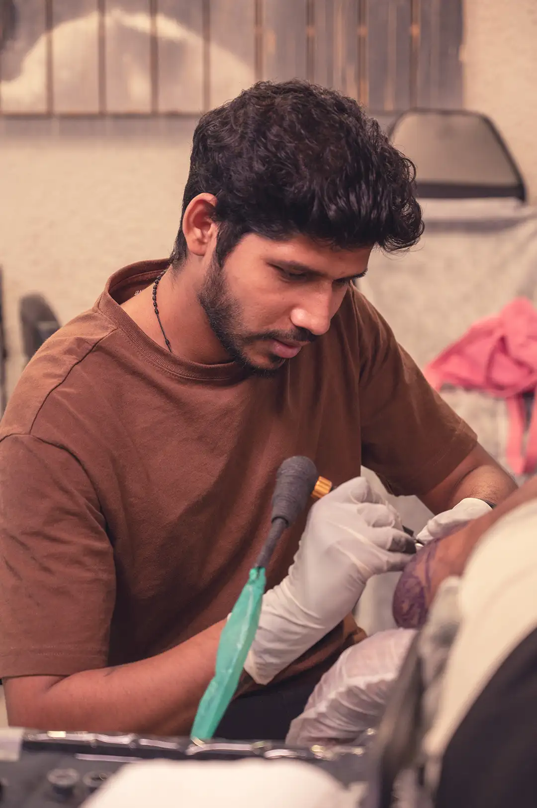 Allan Gois working on Tilak Verma's Tattoo at Aliens Tattoo