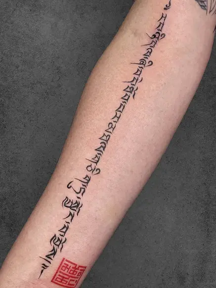 script tattoo on hand