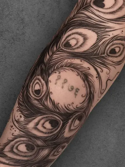 peacock feather tattoo
