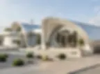 Minimal modern house with curved roof geometry, light materials, and integrated landscape design.
