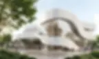 Modern public cultural building with curved façade, transparent glass surfaces, and open plaza.