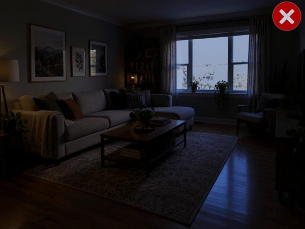 Foto errata della stanza con l’interno troppo scuro e una forte controluce proveniente dalla finestra.