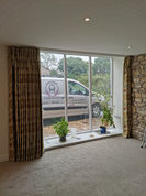 Perfectly pleated curtains for a converted barn.jpg