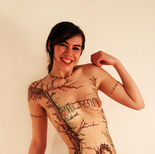 Chocolate body painting "Smile". Fine art hand-piped chocolate body art by Gerhard Petzl.