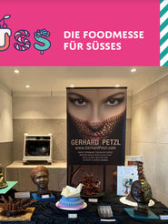 SÜSS fair Bern publication, Gerhard Petzl and his unique chocolate universe with bronze sculptures, hand carved chocolate sculptures, contemporary artworks and Live Body Painting performance.