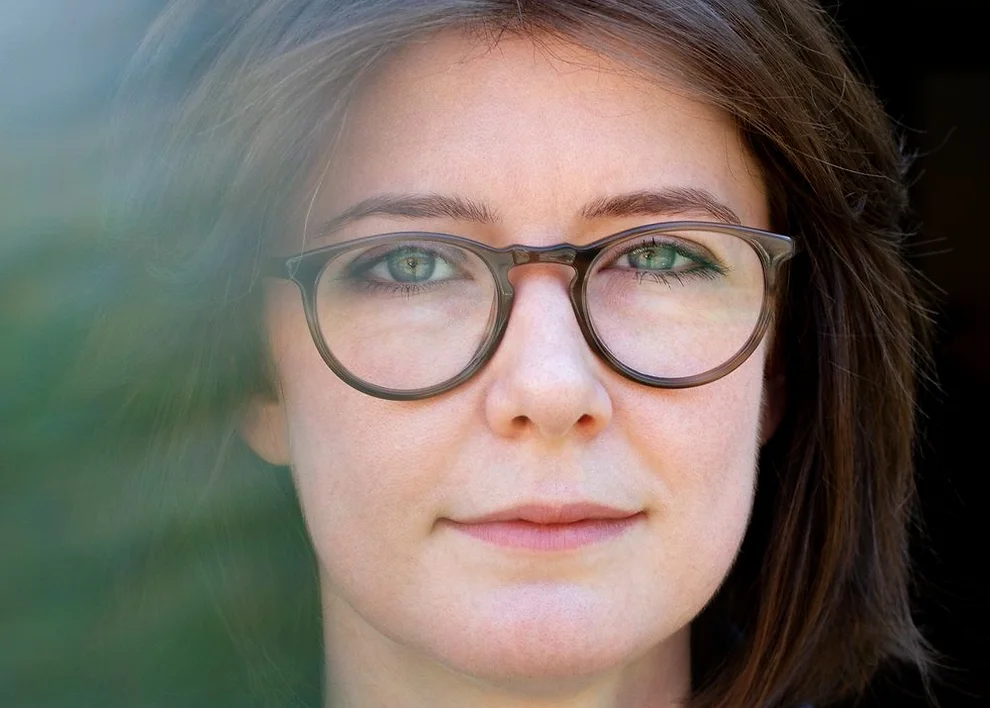 Erin_Sanger_Headshot_edited.webp