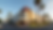 Wide angle view of the SpringHill Suites exterior with clear sky and palm trees