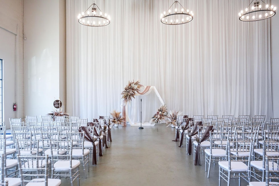Indoor fall wedding ceremony for 200 wedding guests who traveled from Greensboro to attend