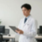 Professional expert in regulatory compliance consulting using a tablet.