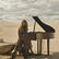 Delta Goodrem playing piano in her Eclipse music video