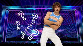 Go-Jo with the Basel Eurovision 2025 stage as a backdrop with question marks floating next to Go-Jo