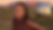 Jessica Mauboy posing in front of a backdrop of Uluru with the artwork work for While I Got Time in the top right corner