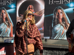 Delta performing at her pop up show in Camden