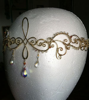 Thumbnail: Fancy  Hammered Brass Circletdripping in Crystals