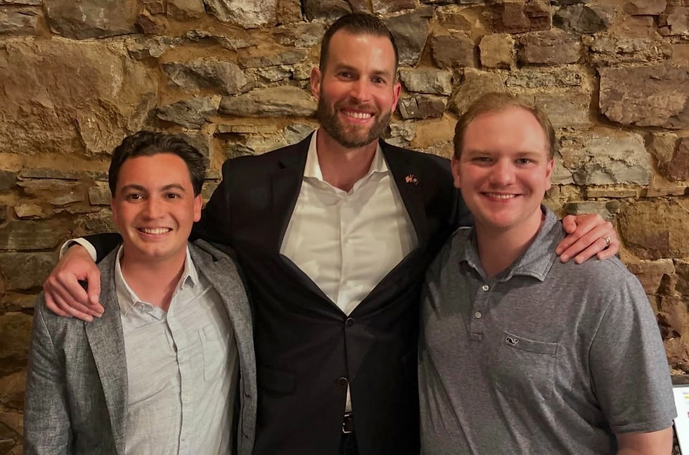 GACR Chairman Chaston Atkins, right, and GACR Executive Director Daniel Shaver, left, with Congressman Clay Fuller at his election watch party in Ringgold for the GA-14 special election runoff. (Clay Fuller Staff)