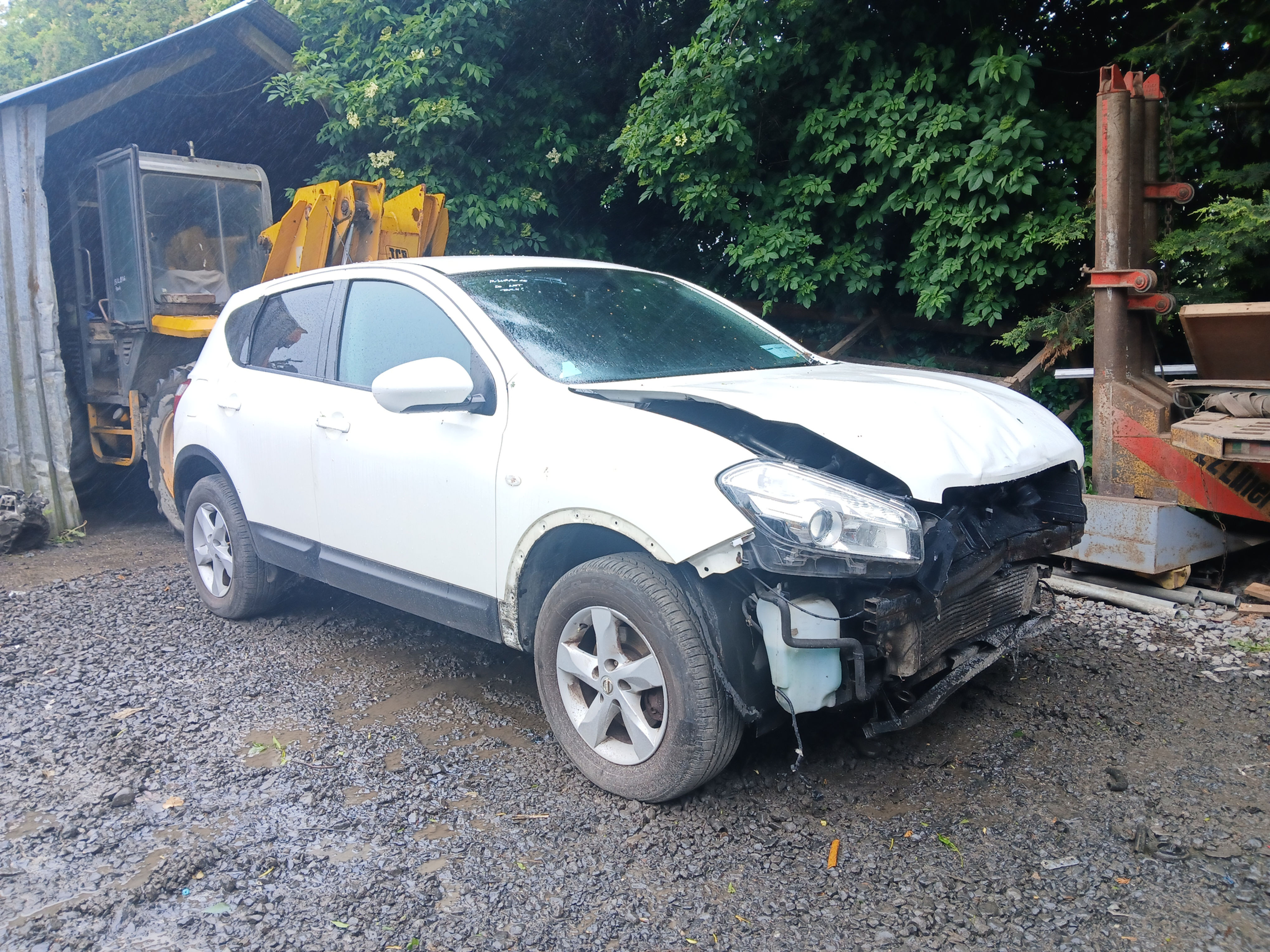 Damaged white Nissan Qashqai at Doolin Dismantlers