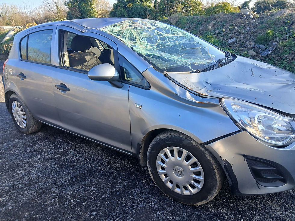 Damaged silver Opel Corsa for parts