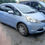 Thumbnail: Light blue Honda Fit, available at Doolin Dismantlers