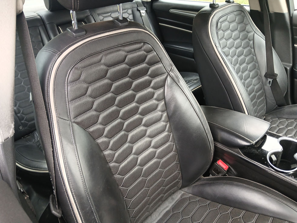 Thumbnail: Black leather Ford Mondeo seats with hexagonal pattern