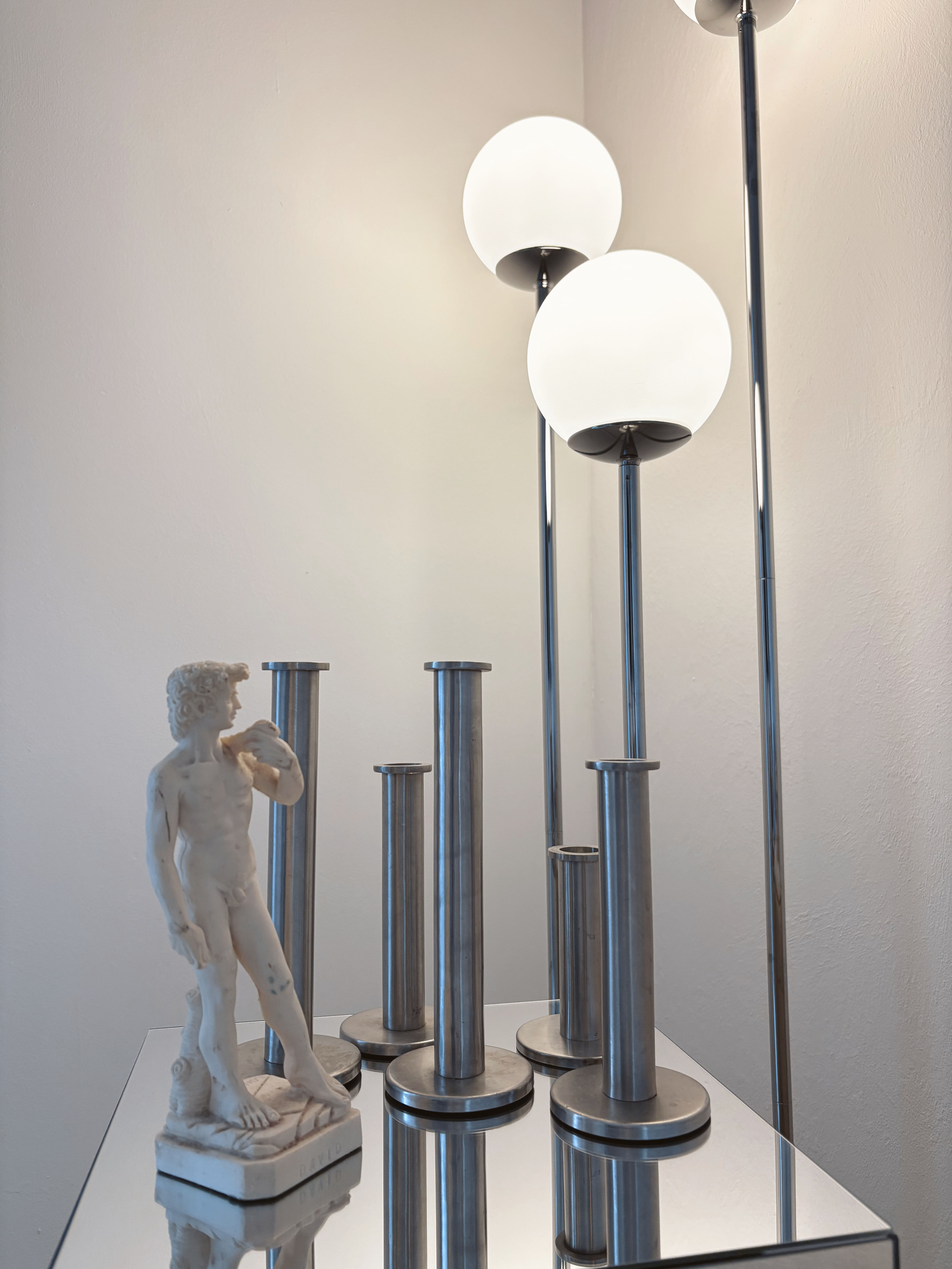 space age metal candlesticks