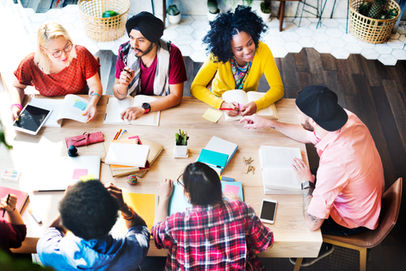 A diverse team working at a table