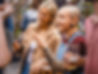 Two people talking at a party