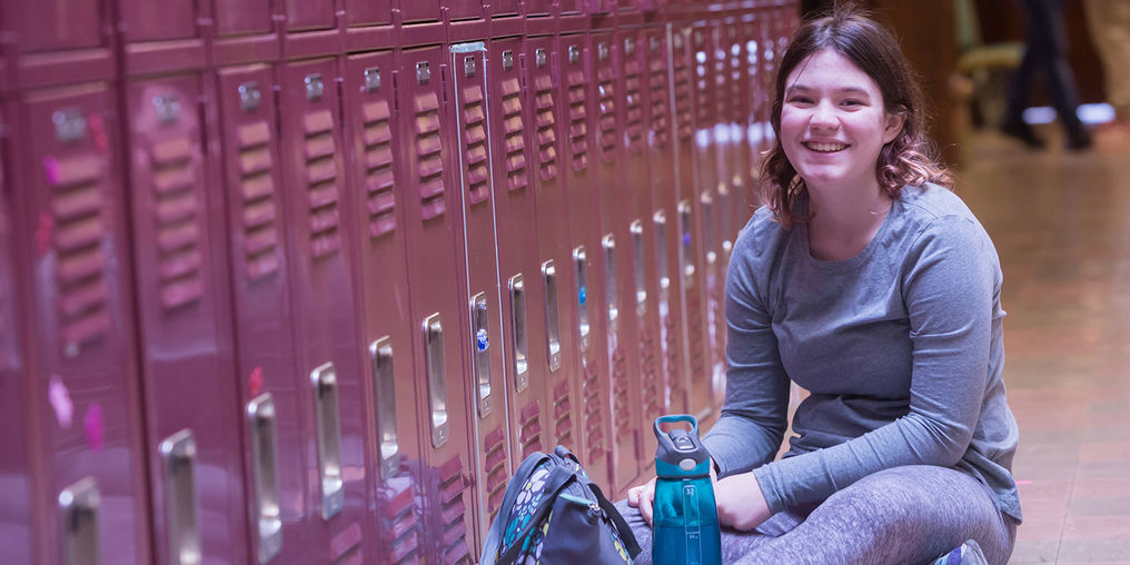Kreiva student in the hallway.