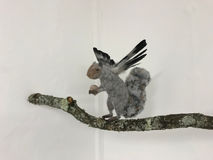 Squigeon wire, tin foil, polymer clay, acrylic paint, wool, real pigeon feathers, tree branch pigeon squirrel hybrid 